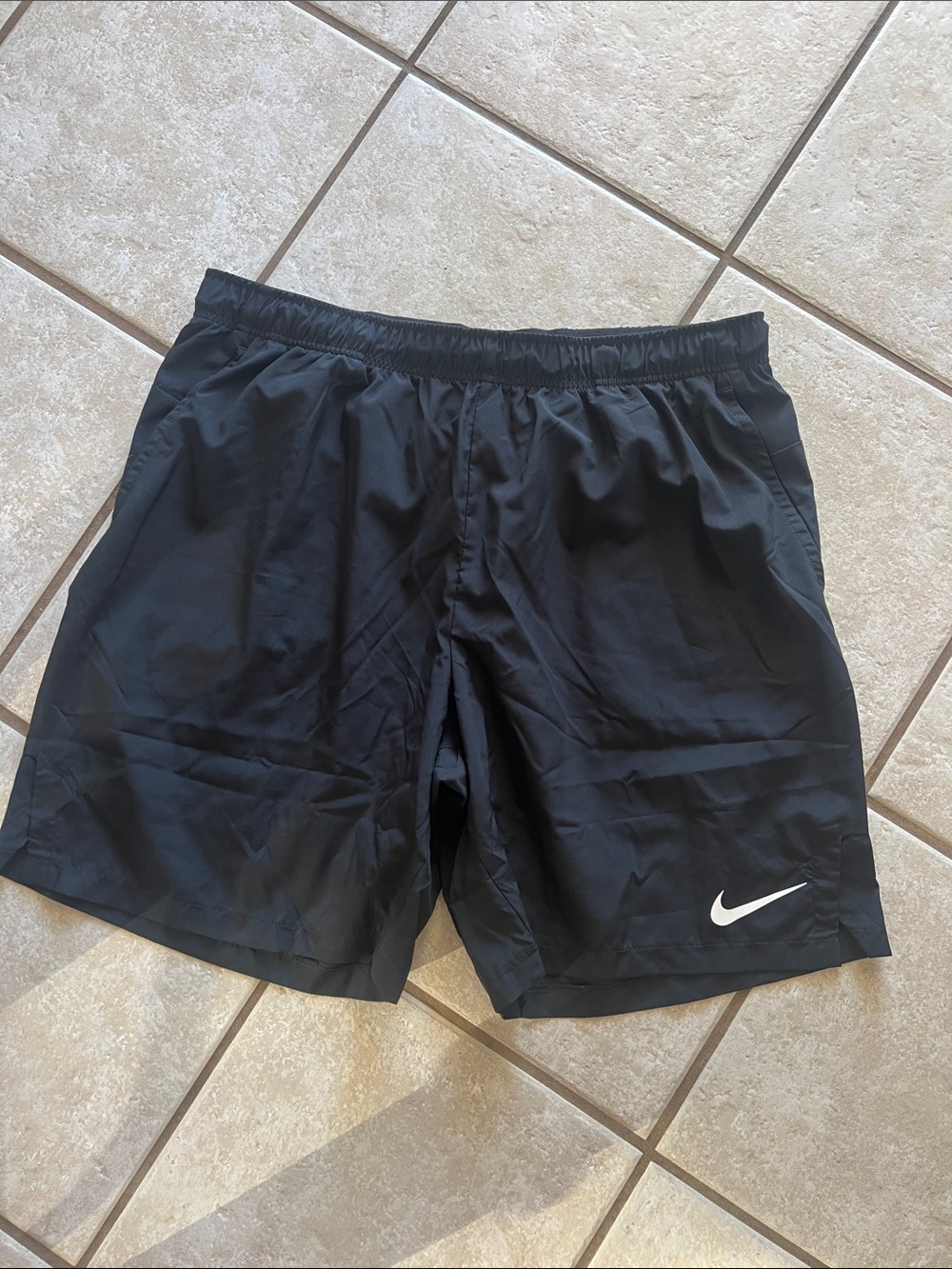 Nike Black Athletic Shorts with White Swoosh